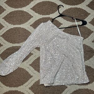 This nude cream sequel blouse is great for the holidays. Wore only once